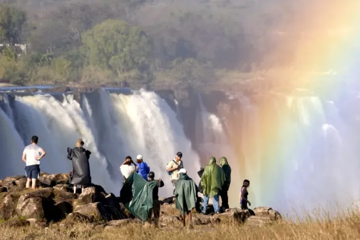 Framed Print : Tourists viewing Victoria Falls, UNESCO World Heritage Site, Zimbabwe, Africa Framed Print : Tourists viewing Victoria Falls, UNESCO World Heritage Site, Zimbabwe, Africa