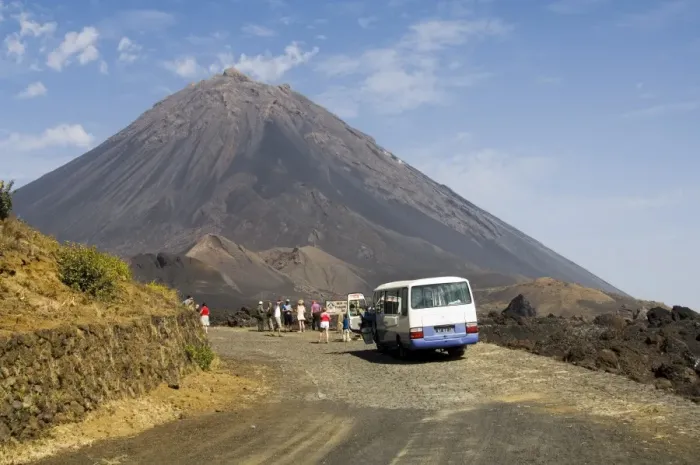Framed Print : Tourists and the volcano of Pico de Fogo in the background, Fogo (Fire) Framed Print : Tourists and the volcano of Pico de Fogo in the background, Fogo (Fire)