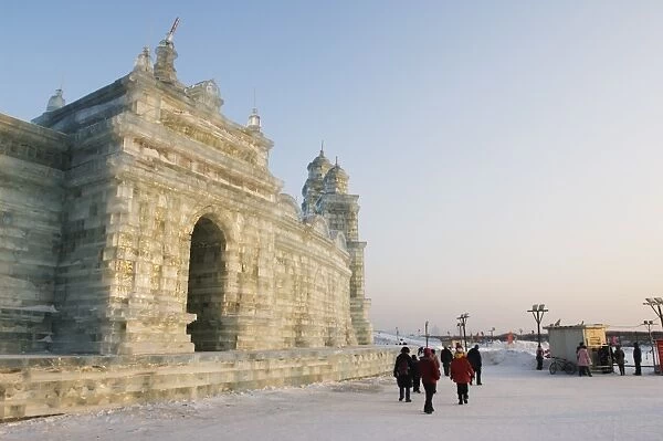 Tourists walking past the snow and Ice Sculptures at the Ice Lantern Festival