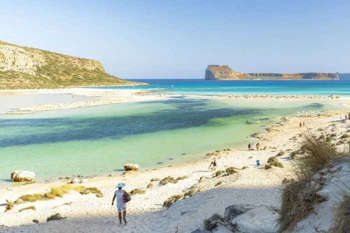 Framed Print : Tourists walking to the white sand beach surrounding Balos lagoon, Crete, Greek Islands Framed Print : Tourists walking to the white sand beach surrounding Balos lagoon, Crete, Greek Islands