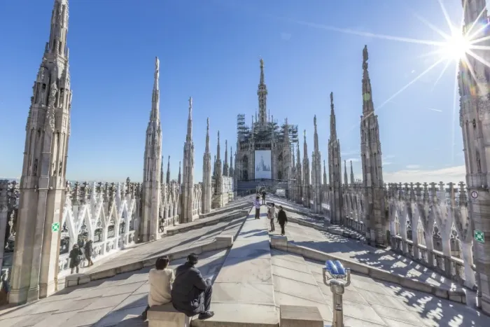 Framed Print : Tourists among the white marble spiers on the top of the Duomo, Milan, Lombardy, Italy Framed Print : Tourists among the white marble spiers on the top of the Duomo, Milan, Lombardy, Italy