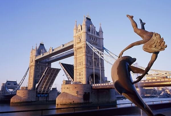 Tower Bridge and bank-side fountain sculpture, London, England, UK