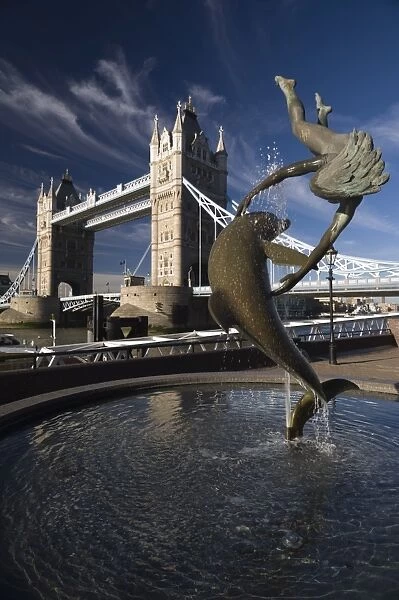 Tower Bridge and the Girl with a Dolphin sculpture, London, England