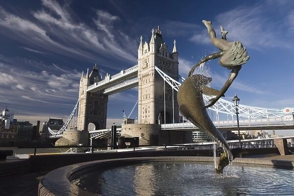 Tower Bridge and Girl with a Dolphin sculpture, London, England