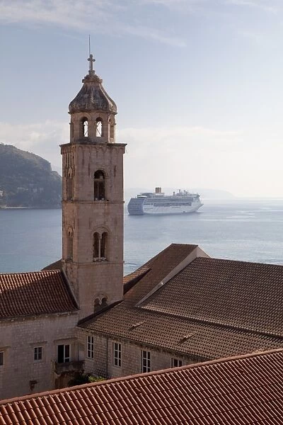 The tower of Dominican Monastery with cruise ship, from Dubrovnik Old Town walls, Dubrovnik, Croatia, Europe