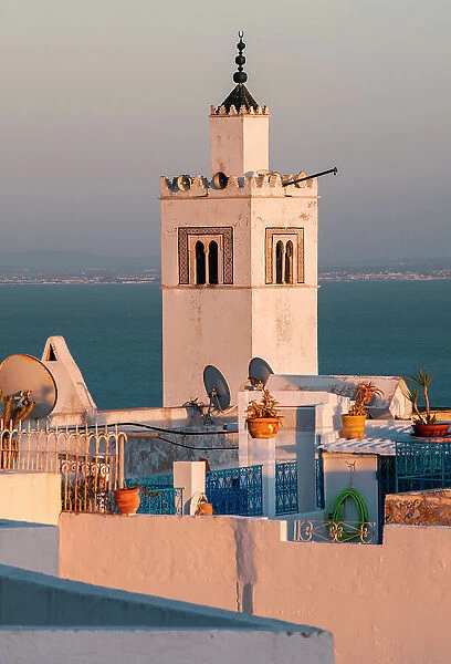 Tower and rooftops of Sidi Bou Said at sunset in front of the Mediterranean, Tunis, Tunisia, North Africa, Africa