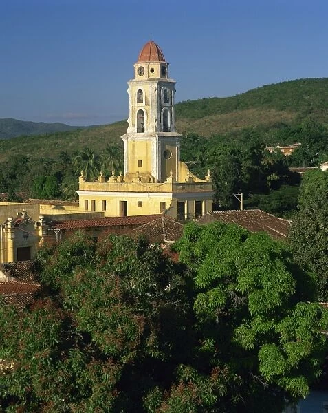 Tower of St. Francis of Assisi Convent church in the Old town, and hills behind at Trinidad