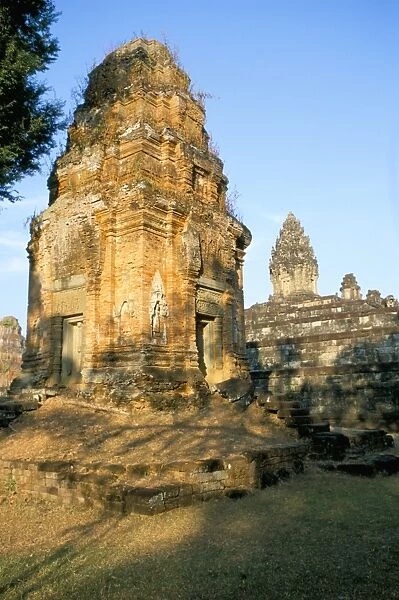 Tower at west and in background the central shrine of the Bakong Temple, Rolous group dating from 9th century, earliest of Angkor temples, Angkor, UNESCO World Heritage Site, Siem Reap, Cambodia, Indochina, Southeast Asia