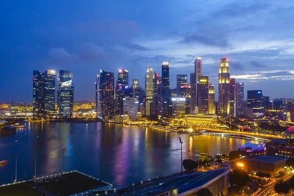 The towers of the Central Business District and Marina Bay by night, Singapore, Southeast Asia