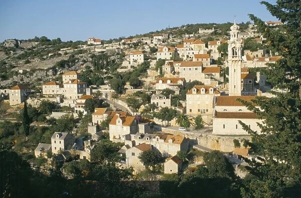Town of Lozisca above steep ravine, Lozisca, Brac Island, Dalmatia, Croatia, Europe