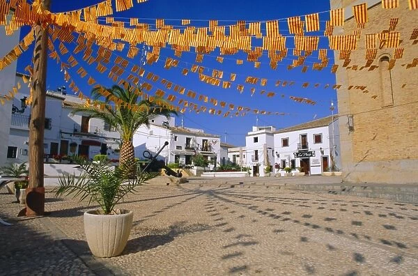 Town square with streamers in regional colours