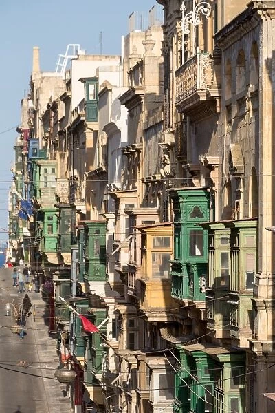 Traditional balconies on the crowded Triq Ir Repubblika street in old town Valletta