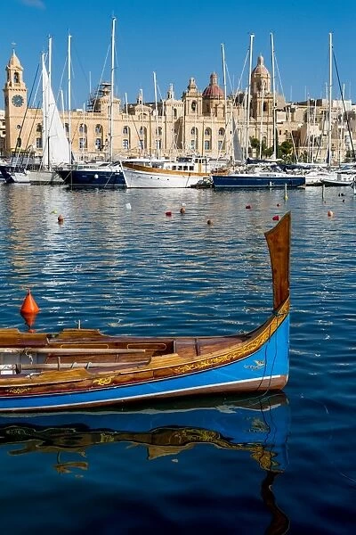 Traditional boat moored in Grand Harbour marina at Birgu, Valletta, Malta, Mediterranean