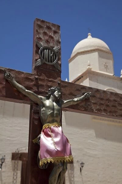 Traditional colonial church and crucifix in Humahuaca in Jujuy province in the Andes