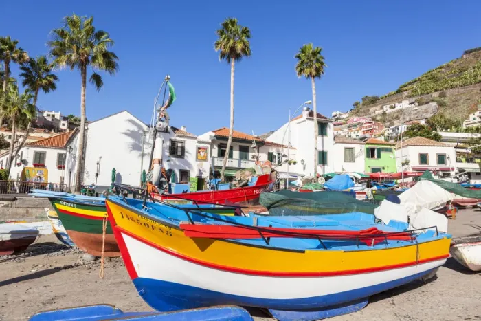 Framed Print : Traditional colourful fishing boats on the beach in Camara de Lobos fishing village