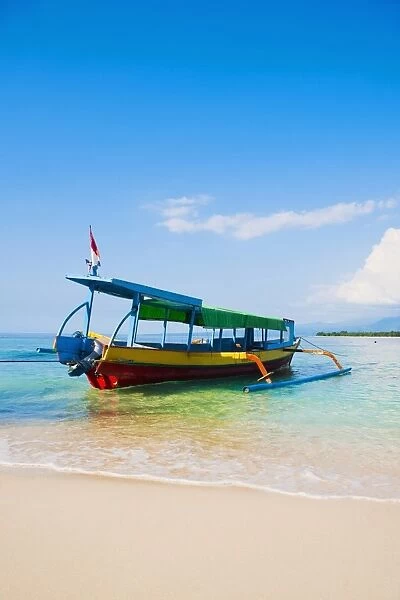 Traditional colourful Indonesian boat on the tropical island of Gili Meno, Gili Islands, Indonesia, Southeast Asia, Asia