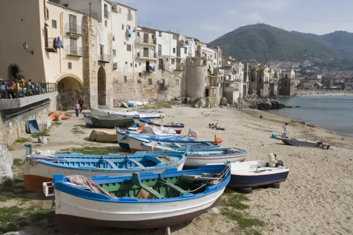 Framed Print : Traditional fishing boats and fishermens houses Framed Print : Traditional fishing boats and fishermens houses