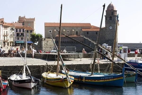 Traditional fishing boats in harbour and Eglise-Notre-Dame-des-Anges, Collioure