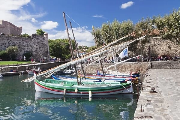 Traditional fishing boats at the port, Chateau Royal Fortress, Collioure, Pyrenees-Orientales