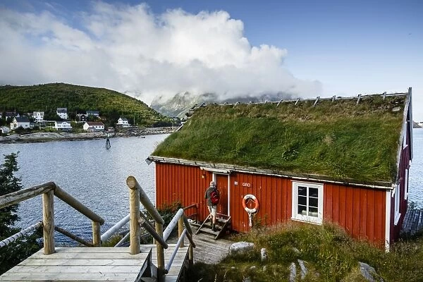 Traditional fishing cabin converted to a hotel, Reine Rorbuer hotel in Reine, Lofoten Islands, Arctic, Norway. Scandinavia, Europe
