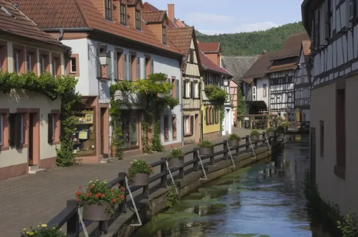 Framed Print : Traditional houses by mill stream along Wassergasse, Annweiler am Trifels, Pfalz wine area, Rhineland Palatinate, Germany, Europe Framed Print : Traditional houses by mill stream along Wassergasse, Annweiler am Trifels, Pfalz wine area, Rhineland Palatinate, Germany, Europe