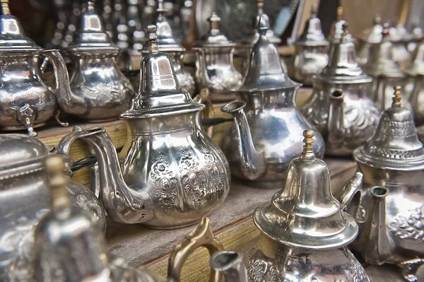 Traditional metal Moroccan mint tea pots for sale in the souks in the old Medina, Marrakech, Morocco, North Africa, Africa