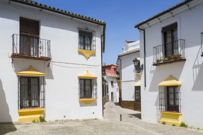 Framed Print : Traditional Spanish whitewashed houses near Plaza Duquesa de Parcent, Ronda, Andalusia Framed Print : Traditional Spanish whitewashed houses near Plaza Duquesa de Parcent, Ronda, Andalusia