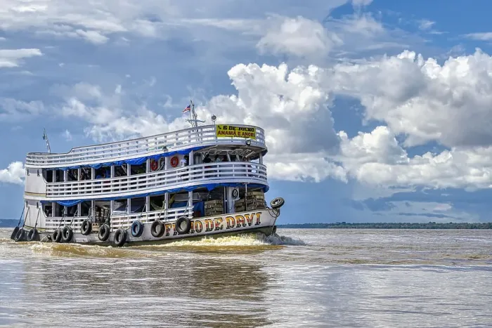 Framed Print : Traditional wooden boat navigating on the Rio Negro, Manaus, Amazonia State, Brazil, South America Framed Print : Traditional wooden boat navigating on the Rio Negro, Manaus, Amazonia State, Brazil, South America