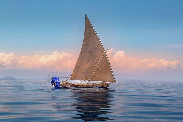 Traditional wooden sailing vessel at sea off the North West coast of Madagascar, Indian Ocean, Africa