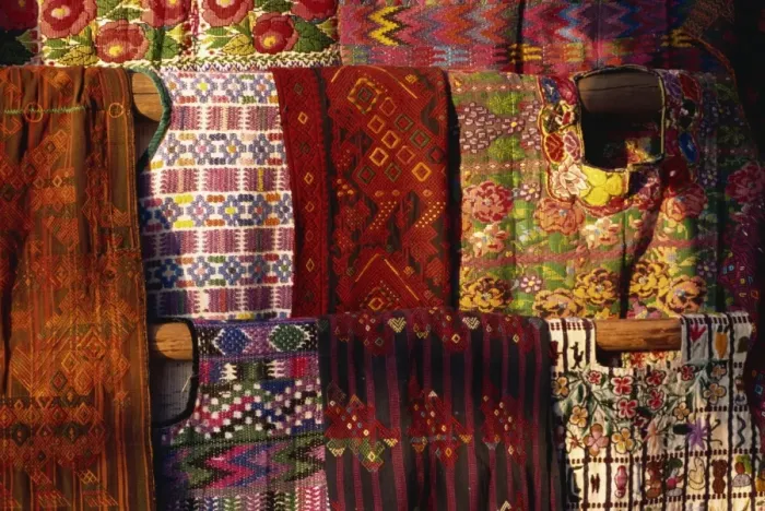 Framed Print : Traditional woven huipiles in the market, Chichicastenango, Quiche Highlands Framed Print : Traditional woven huipiles in the market, Chichicastenango, Quiche Highlands