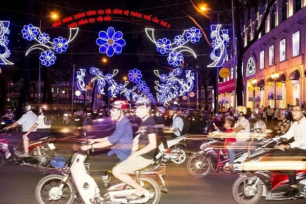 Traffic and Chinese New Year lights, Ho Chi Minh city, Vietnam, Southeast Asia