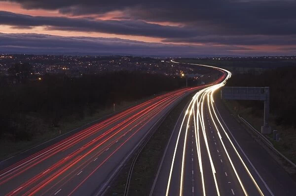 Traffic light trails in the evening on the M1 motorway near junction 28
