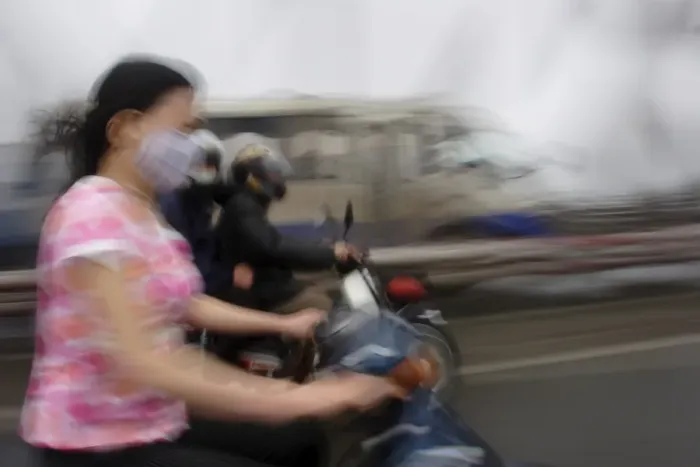 Framed Print : Traffic speeds through Hanoi Framed Print : Traffic speeds through Hanoi