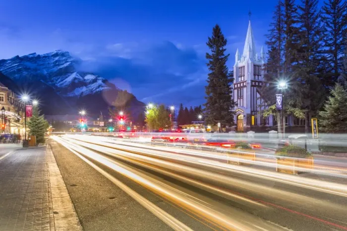 Framed Print : Trail lights on Banff Avenue and St. Pauls Presbyterian Church, Snow Peak visible through clouds Framed Print : Trail lights on Banff Avenue and St. Pauls Presbyterian Church, Snow Peak visible through clouds