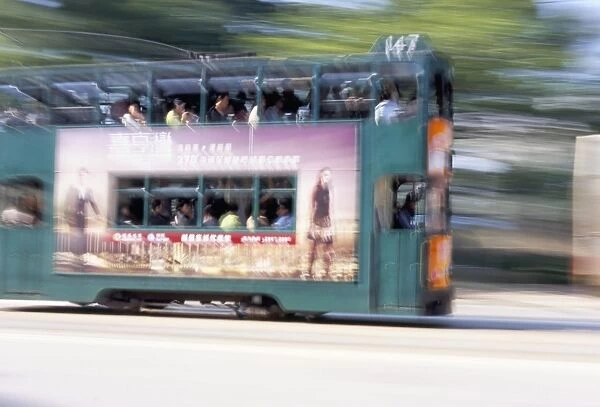 Tram travelling at speed, Causeway Bay, Hong Kong Island, Hong Kong, China, Asia