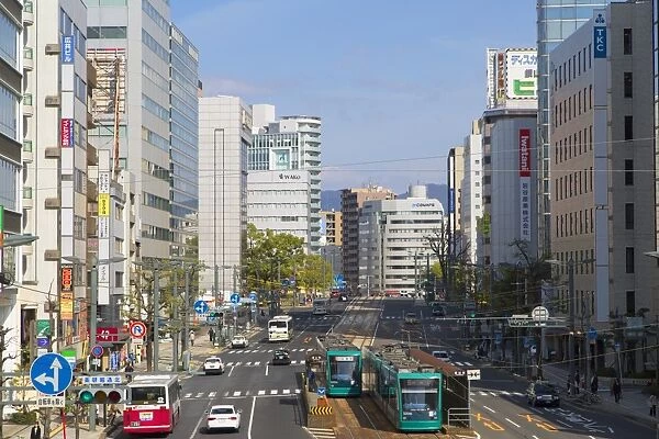 Trams and traffic, Hiroshima, Hiroshima Prefecture, Japan, Asia