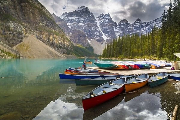 Tranquil setting of rowing boats on Moraine Lake, Banff National Park, UNESCO World Heritage Site