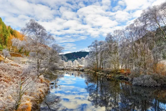 Framed Print : A tranquil view of Loch Doilet and surrounding trees on a calm and frosty winter Framed Print : A tranquil view of Loch Doilet and surrounding trees on a calm and frosty winter