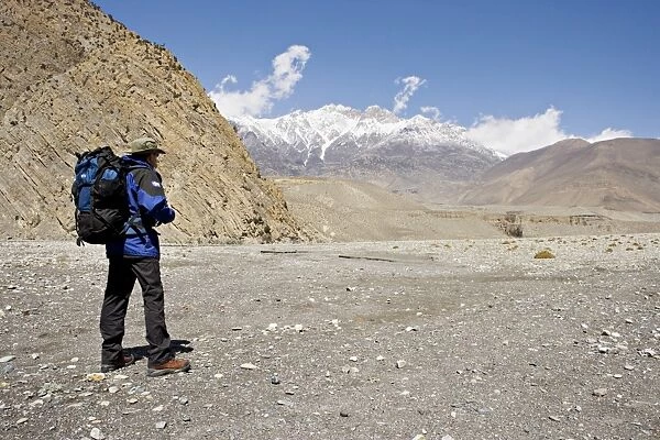 Trekker enjoys the view on the Annapurna circuit trek