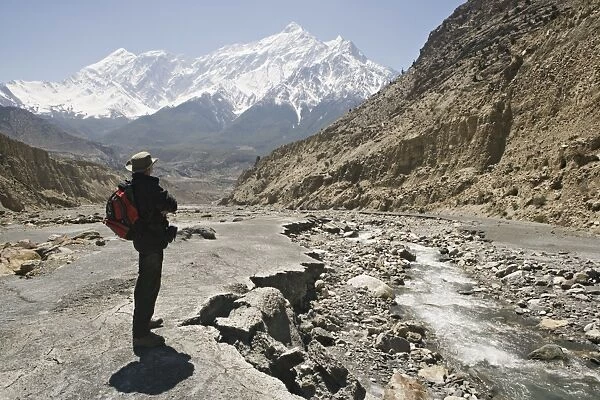 Trekker enjoys the view on the Annapurna circuit trek