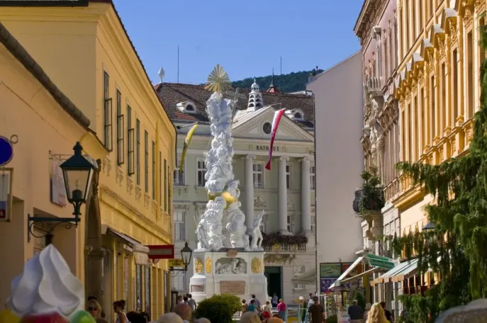 Framed Print : The Trinity Column dating from 1714 and people walking around Hauptplatz surrounded by 18th century buildings, Baden Framed Print : The Trinity Column dating from 1714 and people walking around Hauptplatz surrounded by 18th century buildings, Baden