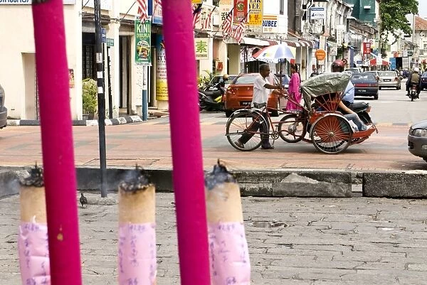 Trishaw and incense, Georgetown, Penang, Malaysia, Southeast Asia, Asia