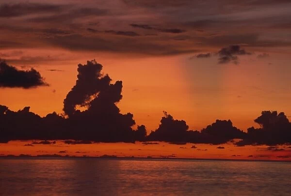 Tropical sunset off Seven Mile Beach, Cayman Islands, West Indies, Central America