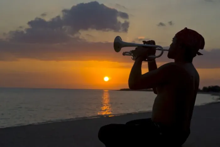 Framed Print : Trumpet player at sunset, Playa Ancon, Trinidad, Cuba, West Indies, Caribbean Framed Print : Trumpet player at sunset, Playa Ancon, Trinidad, Cuba, West Indies, Caribbean