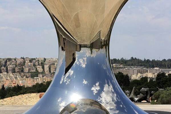 Turning the world upside down by Anish Kapoor, a newly-installed sculpture reflecting the
