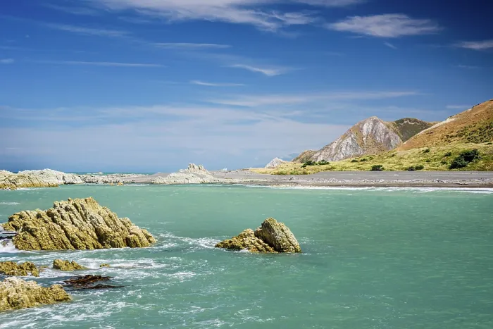 Framed Print : Turquoise Coastal Waters Framed by Rocky Headlands and Hills at Ward Beach, Marlborough, New Zealand Framed Print : Turquoise Coastal Waters Framed by Rocky Headlands and Hills at Ward Beach, Marlborough, New Zealand