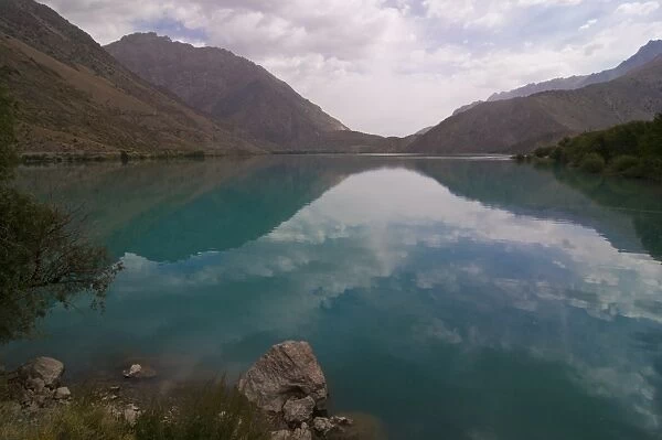 Turquoise Iskanderkul Lake (Alexander Lake) in Fann Mountains, Tajikistan, Central Asia