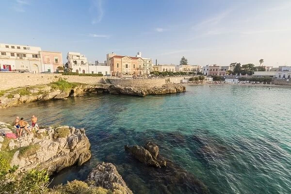 Turquoise sea and cliffs frame the fishing village of Santa Maria al Bagno Gallipoli