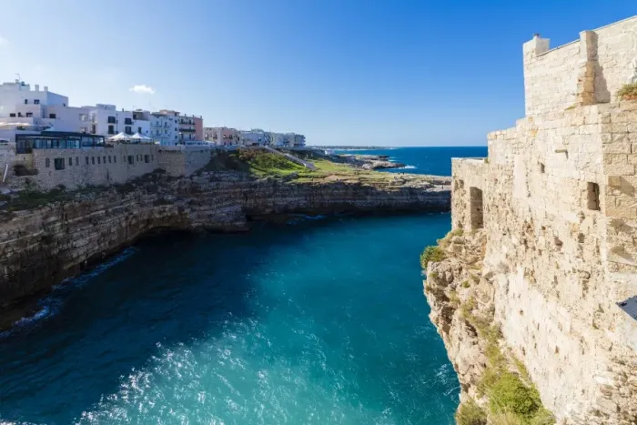 Framed Print : Turquoise sea framed by the old town perched on the rocks, Polignano a Mare, Province of Bari Framed Print : Turquoise sea framed by the old town perched on the rocks, Polignano a Mare, Province of Bari