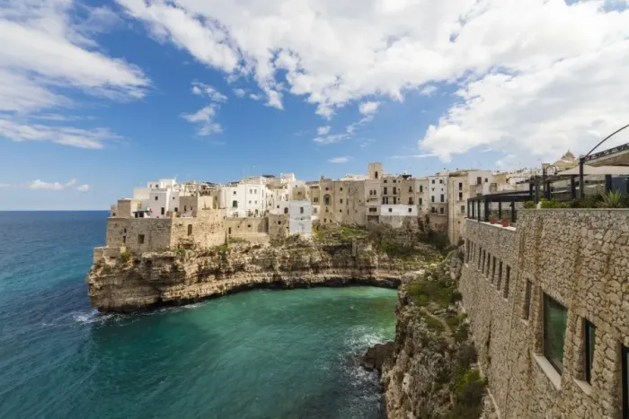 Framed Print : Turquoise sea framed by the old town perched on the rocks, Polignano a Mare, Province of Bari Framed Print : Turquoise sea framed by the old town perched on the rocks, Polignano a Mare, Province of Bari